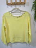 JERSEY AMARILLO TACHUELAS